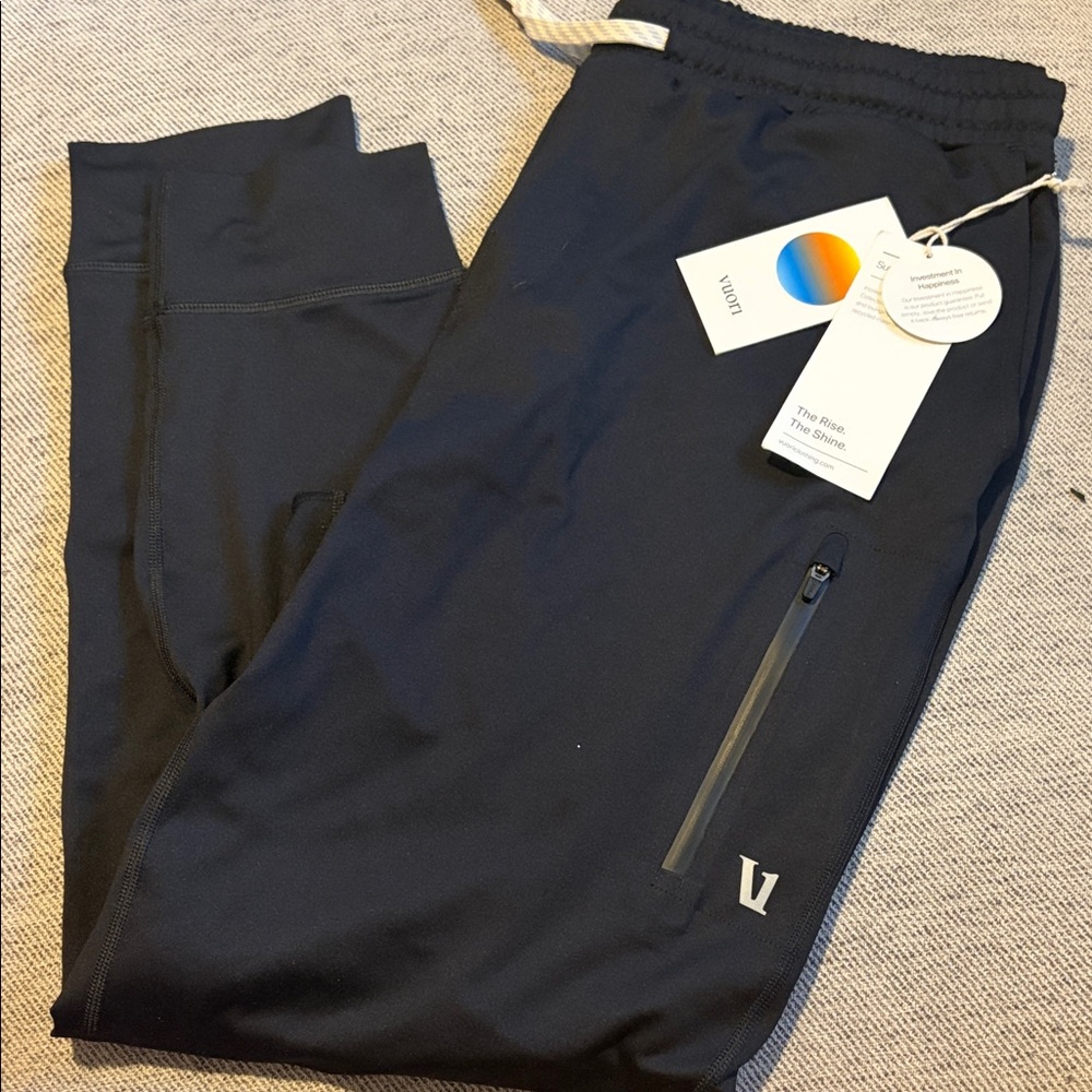 Vuori Black Performance Joggers with Branded Tags. Sunday performance.